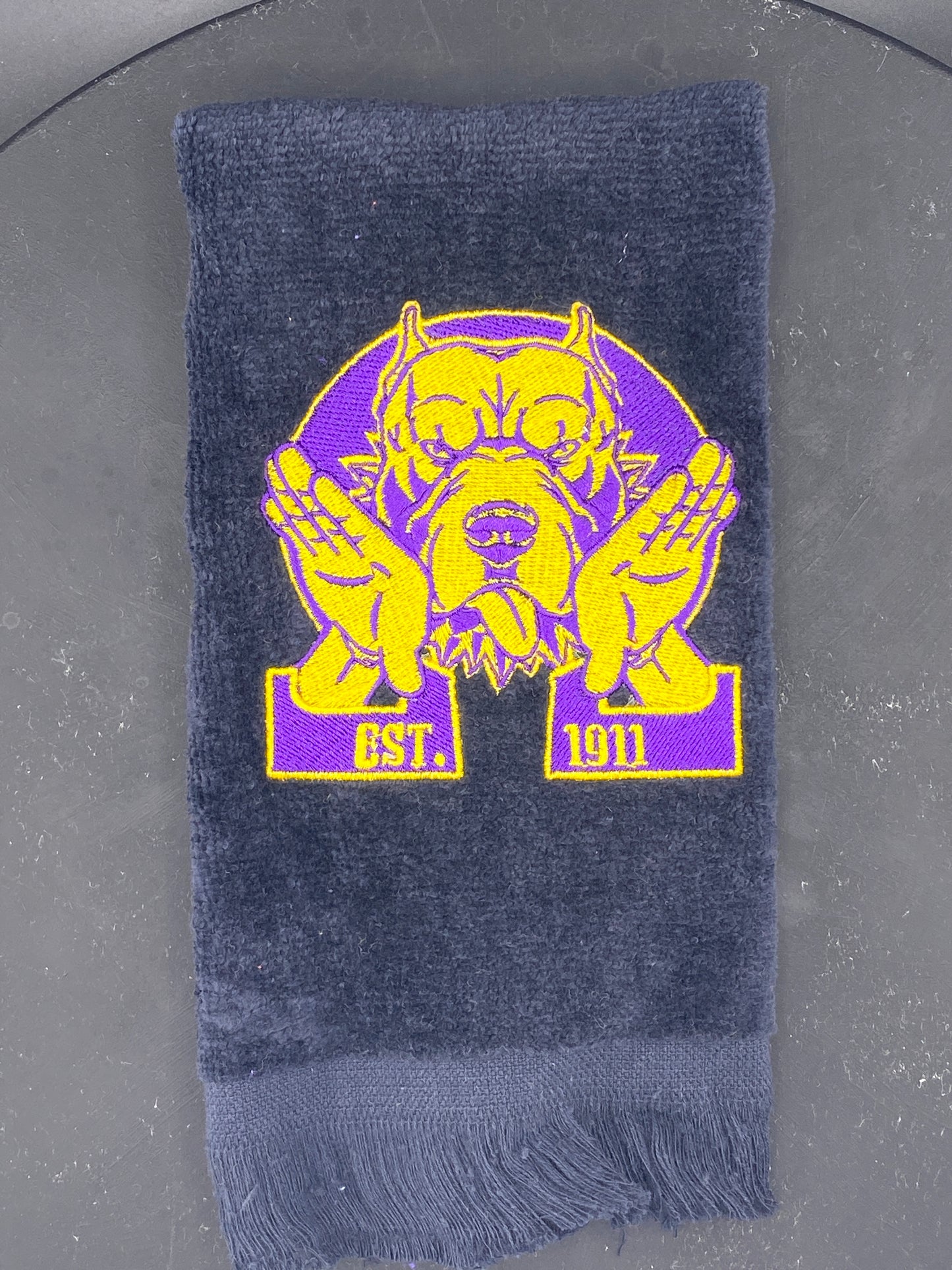 Omega Psi Phi Hooks Towel stitched on a black velour plush towel