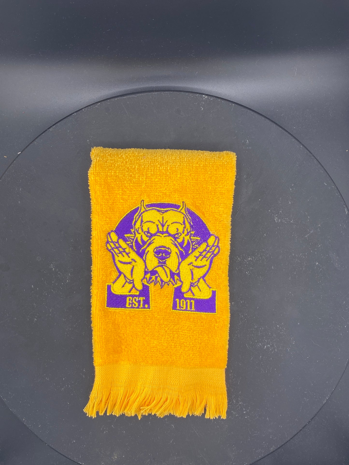 Omega Psi Phi Hooks Towel stitched on a gold velour plush towel