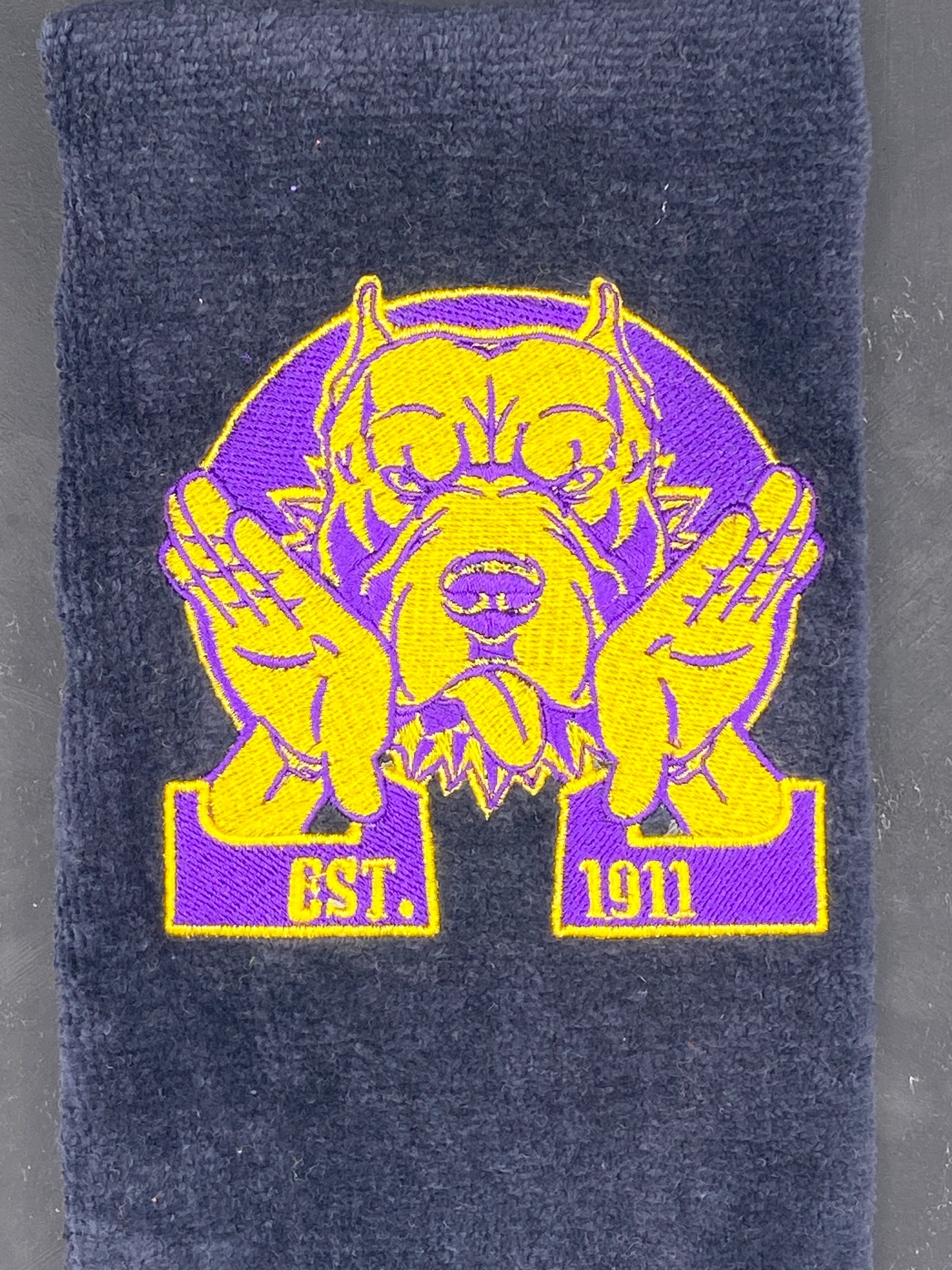 Omega Psi Phi Hooks Towel stitched on a black velour plush towel