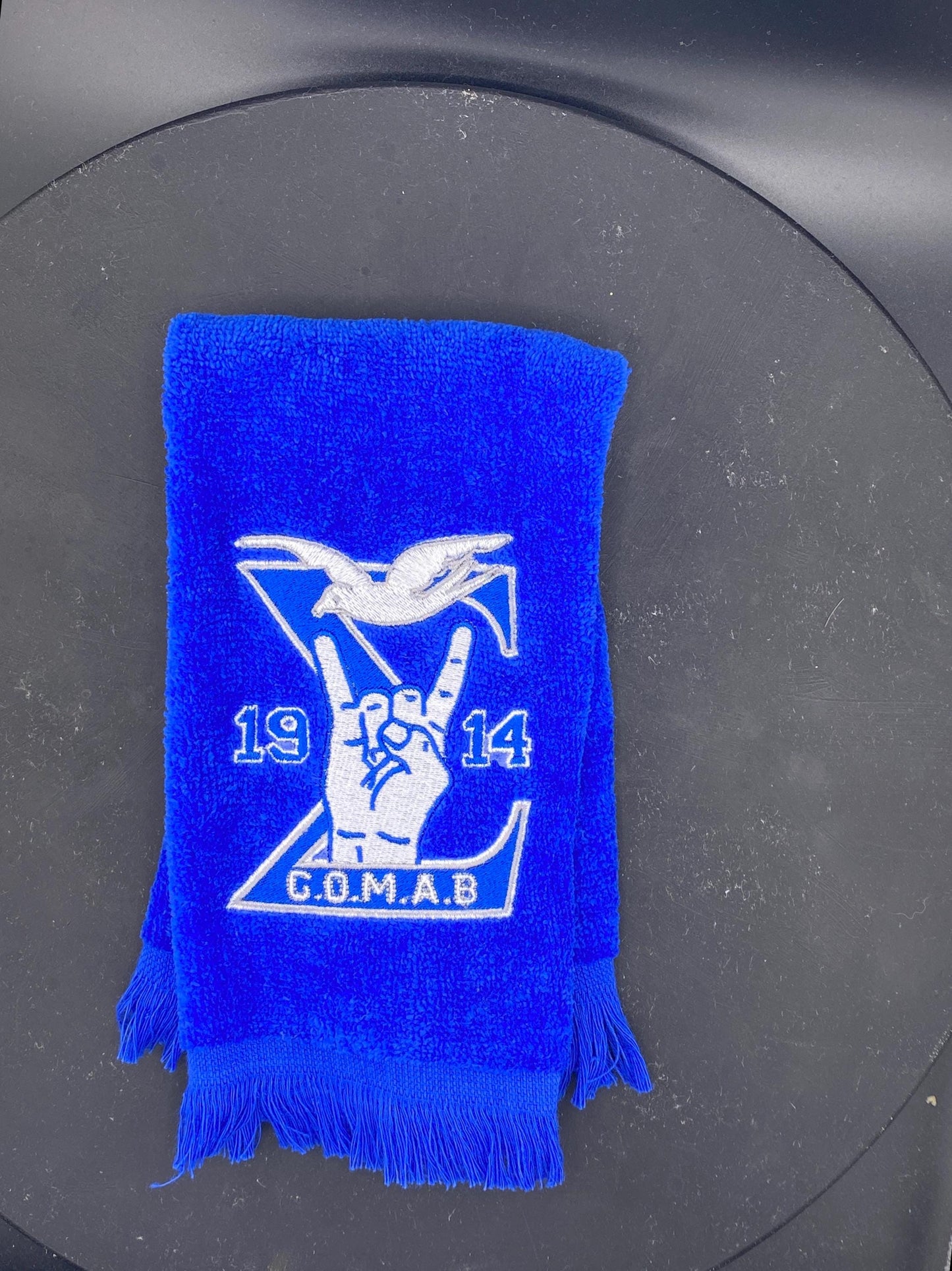 Royal Blue GOMAB Stroll Towel featuring a Dove, 1914, and handsign.
