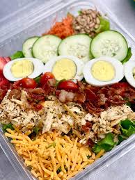 Homestyle 2-12-11 Cafe Breakfast & Soul Food with pine nuts, cucumbers, egg, bacon, cherry tomatoes, cheese and more. 