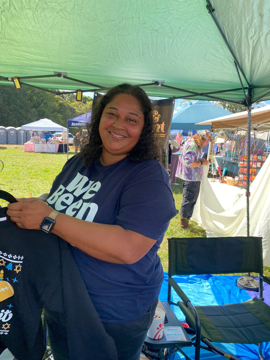 Devin McDaniel, owner of West & Remount Custom Apparel at Feel Good Fest in Concord, NC October 4, 2025