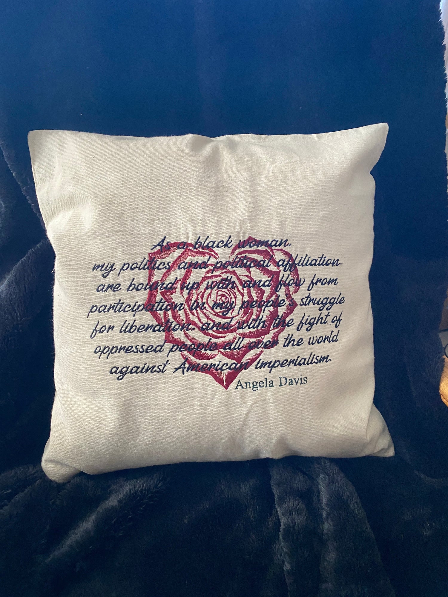 An embroidered pillow case representing Angela told us... - West & Remount Custom Apparel