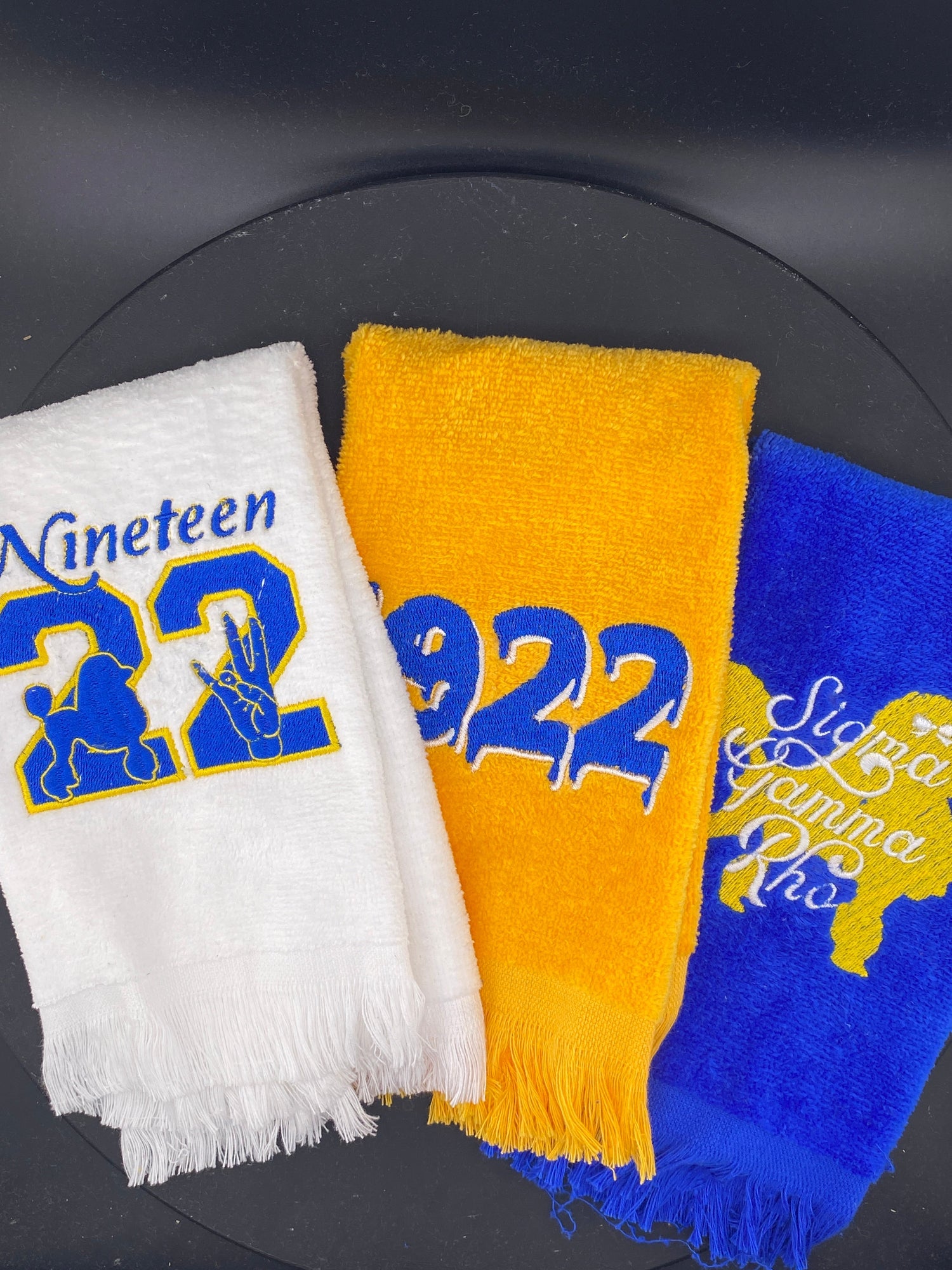 3 Stroll towels in white, gold and rhoyal blue representing Sigma Gamma Rho Sorority - West & Remount Custom Apparel