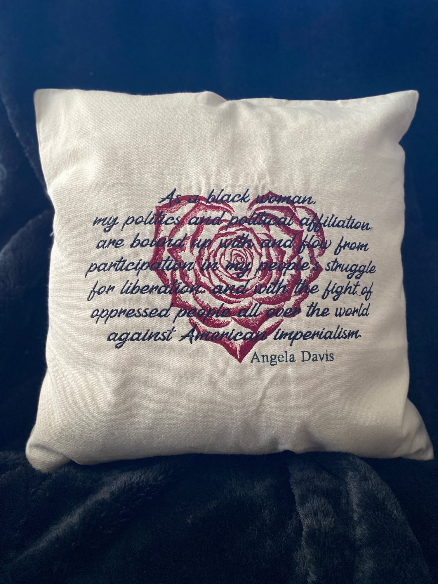 "As a black woman, my politics and political affiliation are bound up with and flow from participation in my people's struggle for liberation, and with the fight of oppressed people all over the world against American imperialism." embroidered on a natural cotton zippered pillow cover