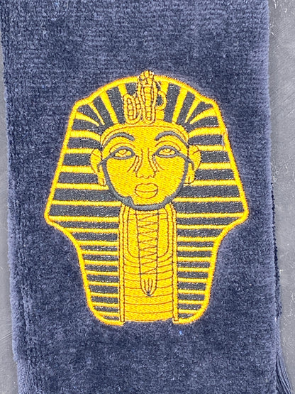 Old Gold Sphinx on black Alpha Phi Alpha Stroll Towel closeup detailed stitching. 