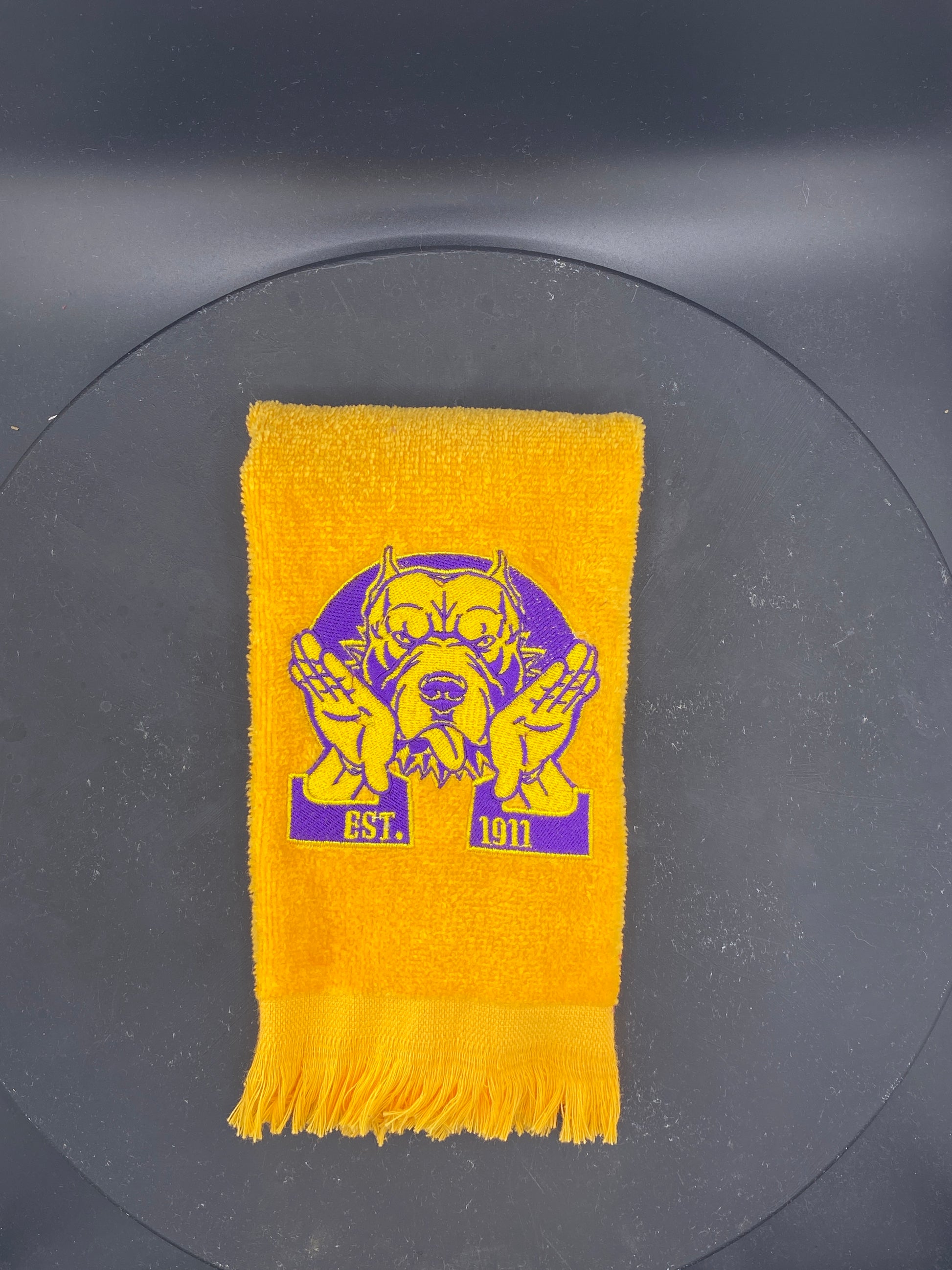 Omega Psi Phi Hooks Towel stitched on a gold velour plush towel