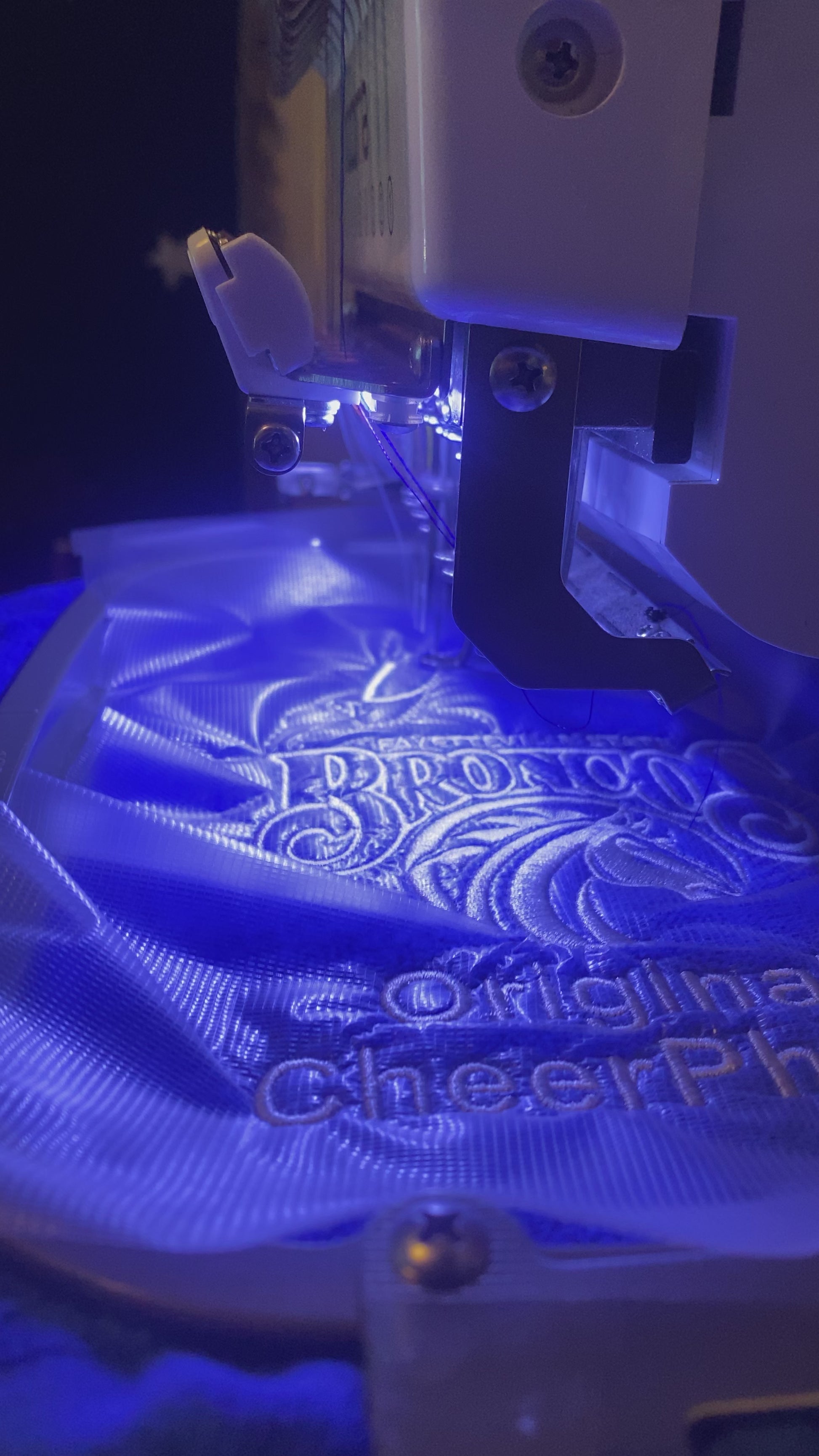In-progress video of personalizing a royal blue Leisure Luxe Towel. 