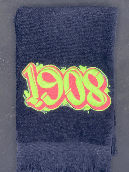 Detail of 1908 black velour Leisure Luxe Towel. 